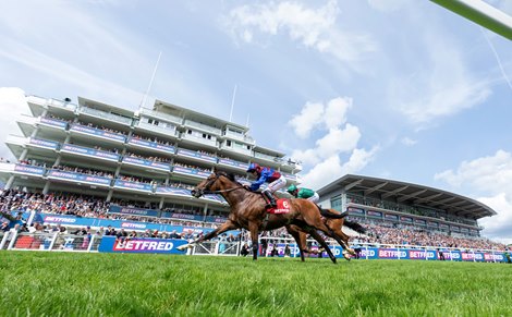 Jan Brueghel (Ryan Moore,nearest) beats Calandagan in the Coronation Cup<br>
Epsom 6.6.25 Pic: Edward Whitaker