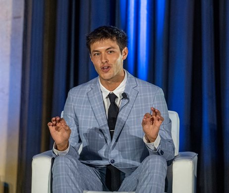 Griffin Johnson, Influencer/Creator. Horse Owner speaks at the Seventy-Third Annual Round Table Conference on Matters Pertaining to Racing held at the Hall of Springs, Thursday, July 31, 202,5 in Saratoga Springs, N.Y.  Photo Courtesy of The Jockey Club.