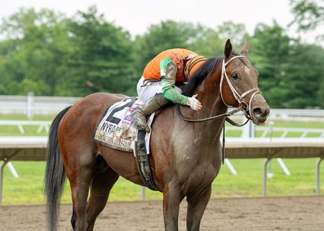 Journalism #2 with UImberto Rispoli riding won the $1,000,000 Grade I NYRA Bets Haskell Stakes at Monmouth Park Racetrack in Oceanport, NJ on Saturday July 19, 2025.  Photo By Joe Labozzetta/EQUI-PHOTO