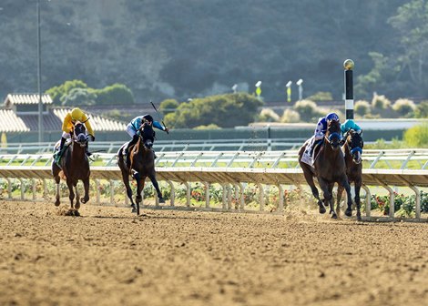 Baoma Corp.’s Nysos and jockey Flavien Prat, right, take off for home to win the Grade II $300,000 San Diego Handicap Saturday, July 26, 2025 at Del Mar Thoroughbred Club, Del Mar, CA. <br>
Benoit Photo