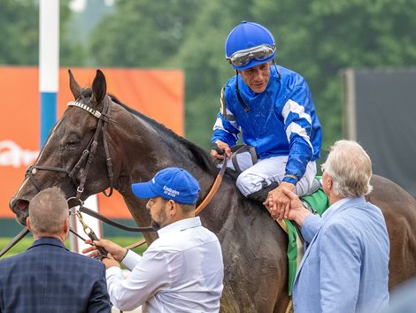 Trainer Bill Mott congratulates jockey Junior Alvarado as he sits atop Sovereignty after winning the 82nd running of The Jim Dandy GII presented by Mohegan Sun at the Saratoga Race Course Saturday July 26, 2025  in Saratoga Springs, N.Y.  Skip Dickstein/for the Times Union