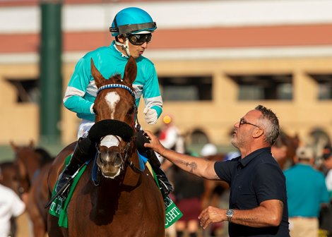 Billy Koch of Little Red Feather Racing, right, has a moment with Though Process and jockey Hector Berrios after their victory in the Grade II, $200,000 San Clemente Handicap, Saturday, July 19, 2025 at Del Mar Thoroughbred Club, Del Mar CA.<br>
© BENOIT PHOTO
