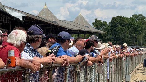 Crowd at the rail before the first race of the 2025 Saratoga Race Course Meet