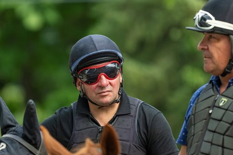 Exercise Rider Carlos Toro sits atop Queen Azteca as they go to the Oklahoma Training Center track for training Thursday August 14, 2025 in Saratoga Springs, N.Y.  Skip Dickstein Photo