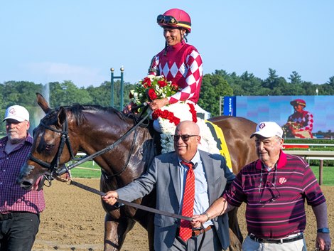 Jockey Jose Ortiz sits atop Nitrogen is lead to the winner’s circle by trainer Mark Casse and owner Len Green after winning the 145th running of The Alabama presented by Keeneland Sale leaves the gate at the Saratoga Race Course  Saturday August 16,  2025 in Saratoga Springs, N.Y.  Skip Dickstein Photo