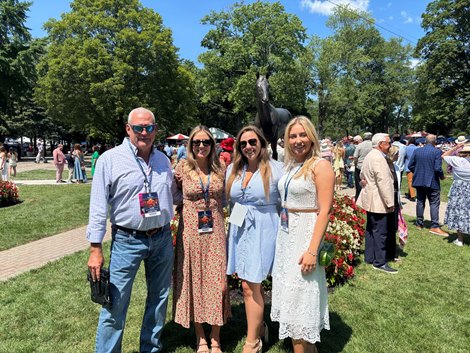 Mark Roberts (left) of Hidden Brook Farm at Ewing's Saratoga Special Stakes with Knicks Go co-breeder Sabrina Moore (second from right)
