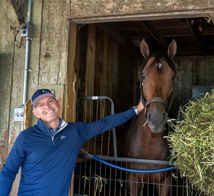 Trainer and Mechanicville native Chad Brown enjoys a fun moment at his barn on the Oklahoma Training Center this Sunday Aug. 3, 2025 with his trainee Sierra Leone who won the 98th running of The Whitney at the Saratoga Race Course in Saratoga Springs, N.Y.  Skip Dickstein Photo