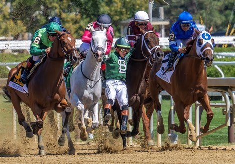 Jockey Irad Ortiz Jr. is unseated from his mount Mindframe and tries to steady himself from falling by reaching for #5 White Abarrio ridden by Edgar Zayas during the 107th running of The Jockey Club Gold Cup at the Saratoga Race Course Sunday Aug. 31, 2025 in Saratoga Springs, N.Y.  Skip Dickstein/ courtesy of the Albany Times Union.
