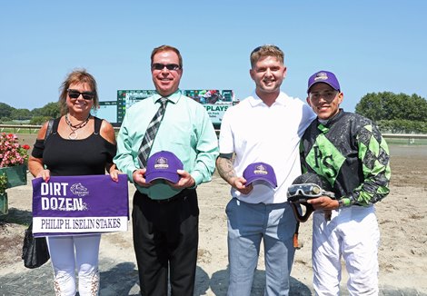 (L to R) Premier Stables Lori and Brian Shyda, Trainer Panagiotis Synnefias and Jockey Samuel Marin after Surface To Air  #6  with Samuel Marin riding won the $250,000 Grade III Philip H. Iselin Stakes at Monmouth Park Racetrack in Oceanport, NJ on Saturday August 16, 2025.  Photo By Bill Denver/EQUI-PHOTO