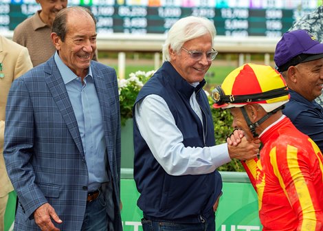 Co-owner Karl  Watson, left, trainer Bob Baffert and jockey Mike Smith celebrate after Smith guided Nevada Beach to victory  the Grade I $300,000 Goodwood Stakes Saturday, September 27, 2025 at Santa Anita Park, Arcadia, CA.<br>
Benoit Photo