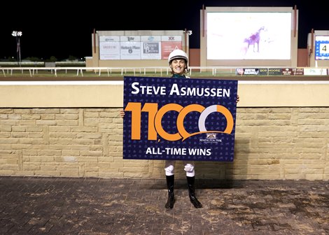 Beau Soleil wins the eighth race Saturday, October 11, 2025 at Remington Park to give trainer Steve Asmussen his 11,000th victory in North America. Son Erik Asmussen rode the filly owned by Clark Brewster of Tulsa, Okla.Credit: Dustin Orona Photography/Remington Park