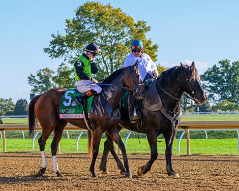 Thorpedo Anna being lead by Harley before  the Juddmonte Spinster (G1) at Keeneland on Oct. 5, 2025.