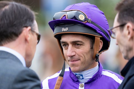 Christophe Soumillon speaks with Aidan O'Brien after Precise's win in the Fillies' Mile<br>
Newmarket 10.10.25 Pic: Edward Whitaker