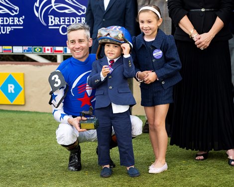 Flavien Prat with his kids in the winner’s circle after Nysos wins the Dirt Mile (G1) at Del Mar Racetrack in Del Mar, CA on November 1, 2025.