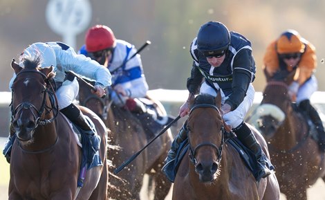 Ryan Moore and Lazzar win the 6f novice stakes<br>
Lingfield 3.12.25 Pic: Edward Whitaker