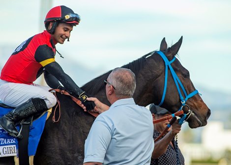 Margarita Girl's co-owner Hans Maron, right, congratulates jockey Ricardo Gonzalez after victory in the Grade III $100,000 Las Flores Stakes Sunday, January 11, 2026 at Santa Anita Park, Arcadia.  The four-year-old daughter by Twirling Candy is owned by Saints or Sinners and Rancho Temescal Thoroughbred Partners and trained by Mark Glatt.<br>
Benoit Photo