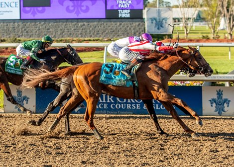 3-21-26 Emerging Market, with Flavien Prat aboard in red and white silks, wins the 113th running of the $1,000,000 Grade II Louisiana Derby at Fairgrounds Racecourse in New Orleans, LA. Hodges Photography/Lou Hodges, Jr