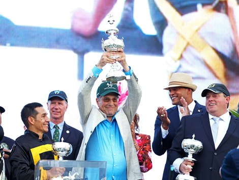 Owner Al Gold holds up the trophy after Napoleon Solo #10 with Paco Lopez riding won the $2,000,000 Grade I Preakness Stakes at Laurel Racecourse on Saturday May 16, 2026. Photo By Bill Denver/EQUI-PHOTO