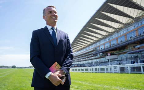 Francis-Henri Graffard heads out for a walk of the track before racing<br>
Ascot 25.7.26 Pic: Edward Whitaker