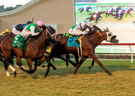 King of Gosford and jockey Umberto RIpoli, right, outleg Detain (Juan Hernandez), left, to win the Grade II, $300,000 Del Mar Mile, Saturday, August 22, 2026 at Del Mar Thoroughbred Club, Del Mar CA. © BENOIT PHOTO